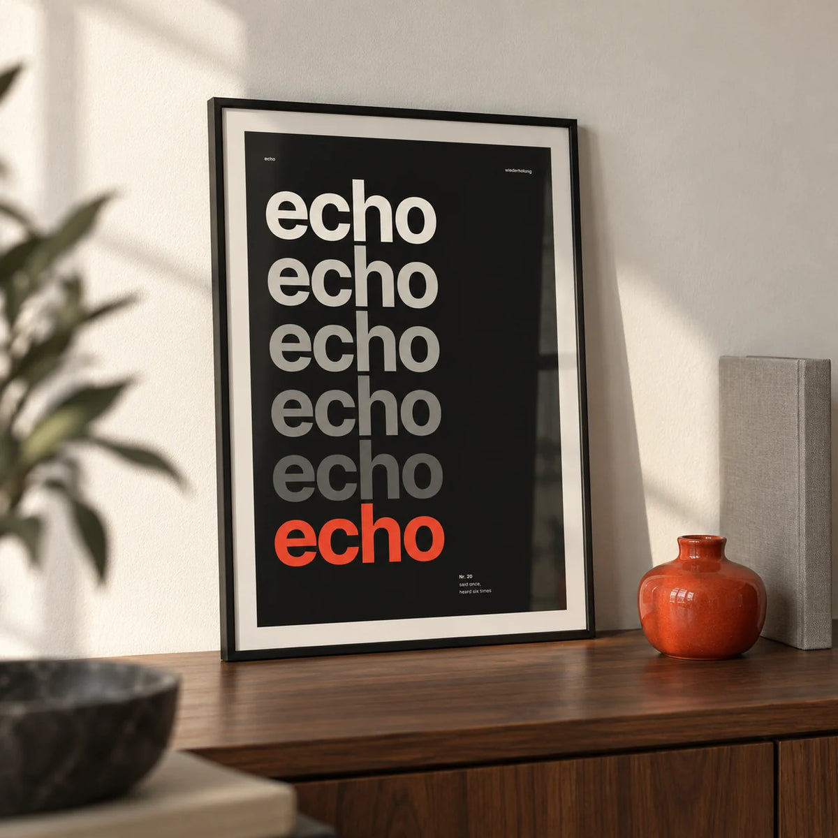 Word Poster, a small A4 framed print leaning on a walnut shelf in a living room