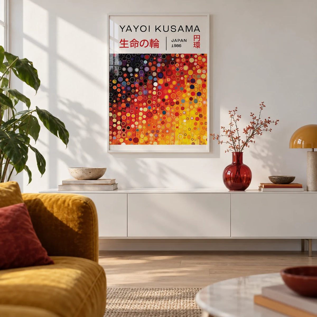 Yayoi Kusama Circles, framed on the wall of a design-led city flat living room with a white wall and a pale oak floor