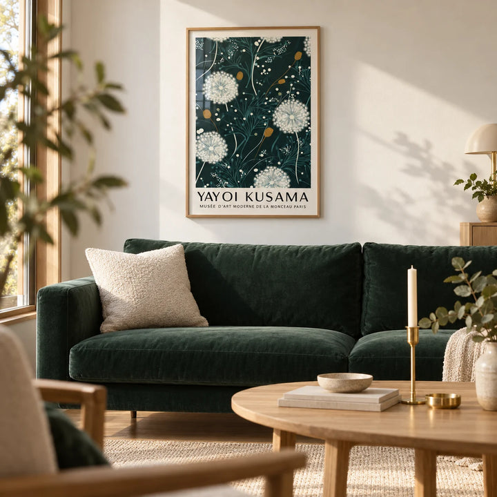 Yayoi Kusama Green Print, framed on the wall of a calm living room with a warm white wall and a light oak floor