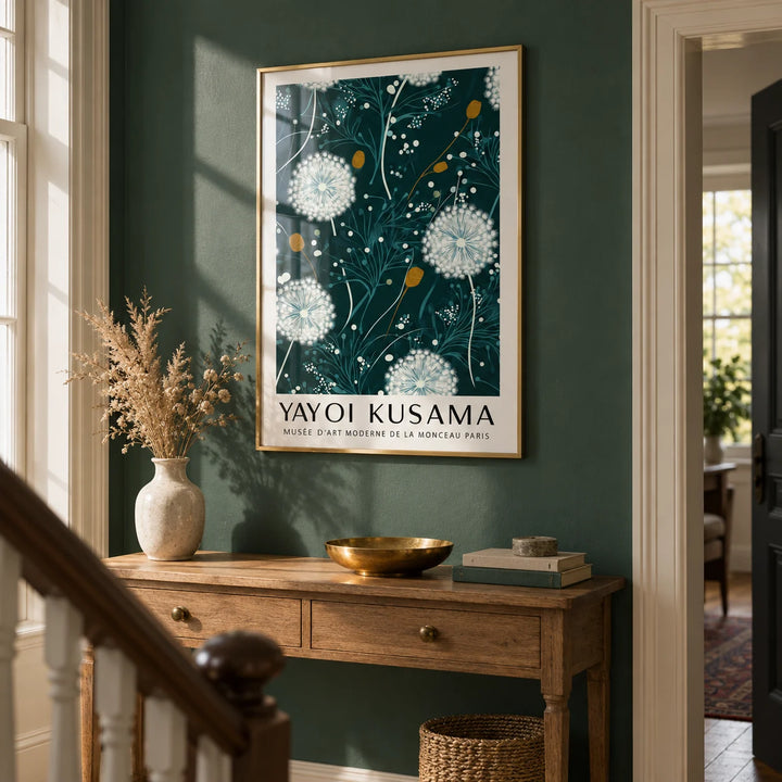 Yayoi Kusama Green Print, framed on the wall of a period hallway with a deep green wall