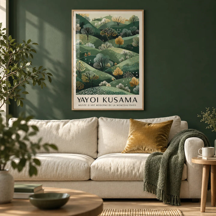 Yayoi Kusama Paintings, framed on the wall of a calm living room with a deep forest green painted wall and a pale oak floor