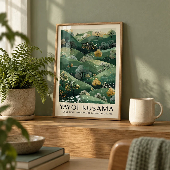 Yayoi Kusama Paintings, a small A4 framed print leaning on an oak shelf in a living room