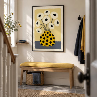 Yellow Vase Poster, framed on the wall of a welcoming hallway in a UK terrace with off-white walls and a simple grey stone floor
