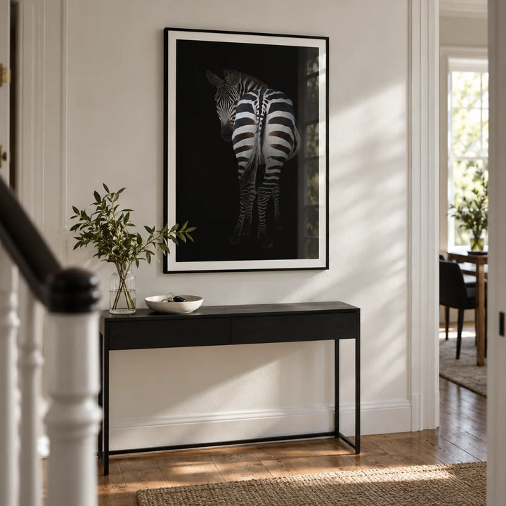 Zebra Art Print, framed on the wall of a narrow contemporary hallway in a UK townhouse with chalk-white walls and a warm timber floor