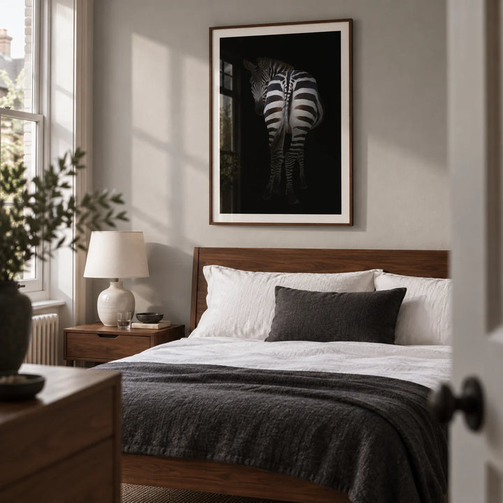Zebra Art Print, framed on the wall of a restful minimalist bedroom in a renovated UK terrace with a pale grey wall