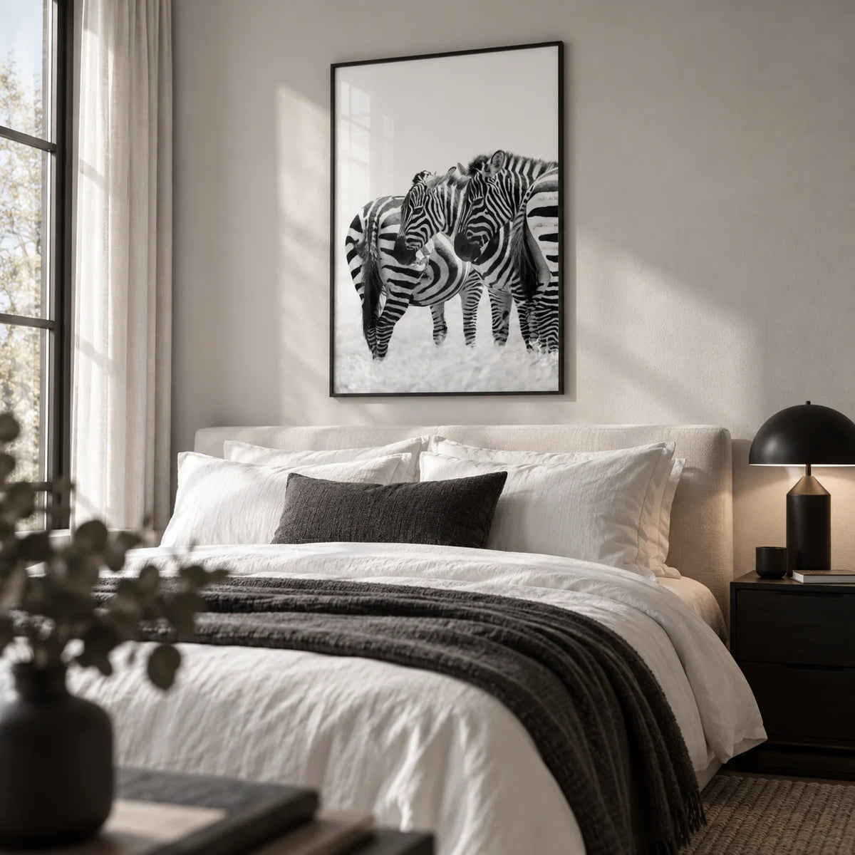 Zebra Wall Art, framed on the wall of a monochrome bedroom