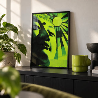 Zen Face Wall Art, a small A4 framed print leaning on a black shelf in a living room