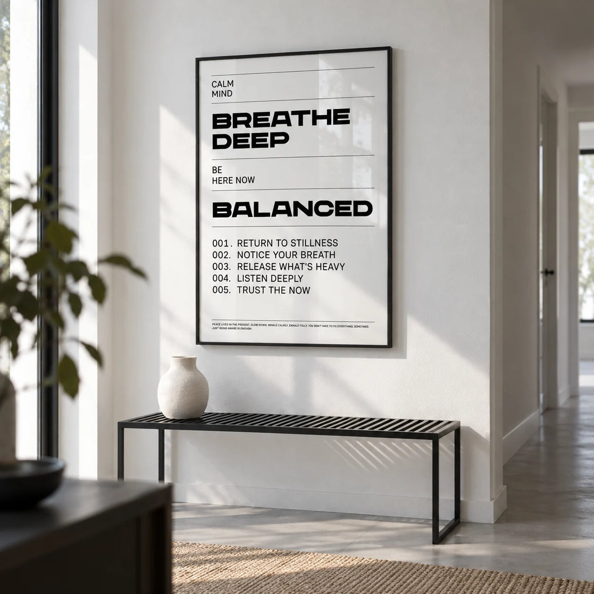 Zen Quotes Breath, framed on the wall of a bright white hallway with a pale grey floor