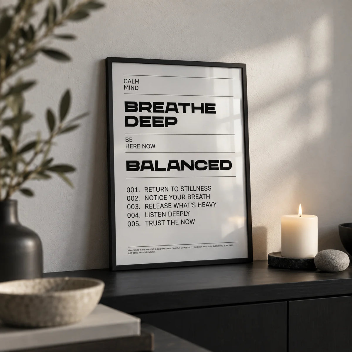 Zen Quotes Breath, a small A4 framed print leaning on a black shelf in a living room