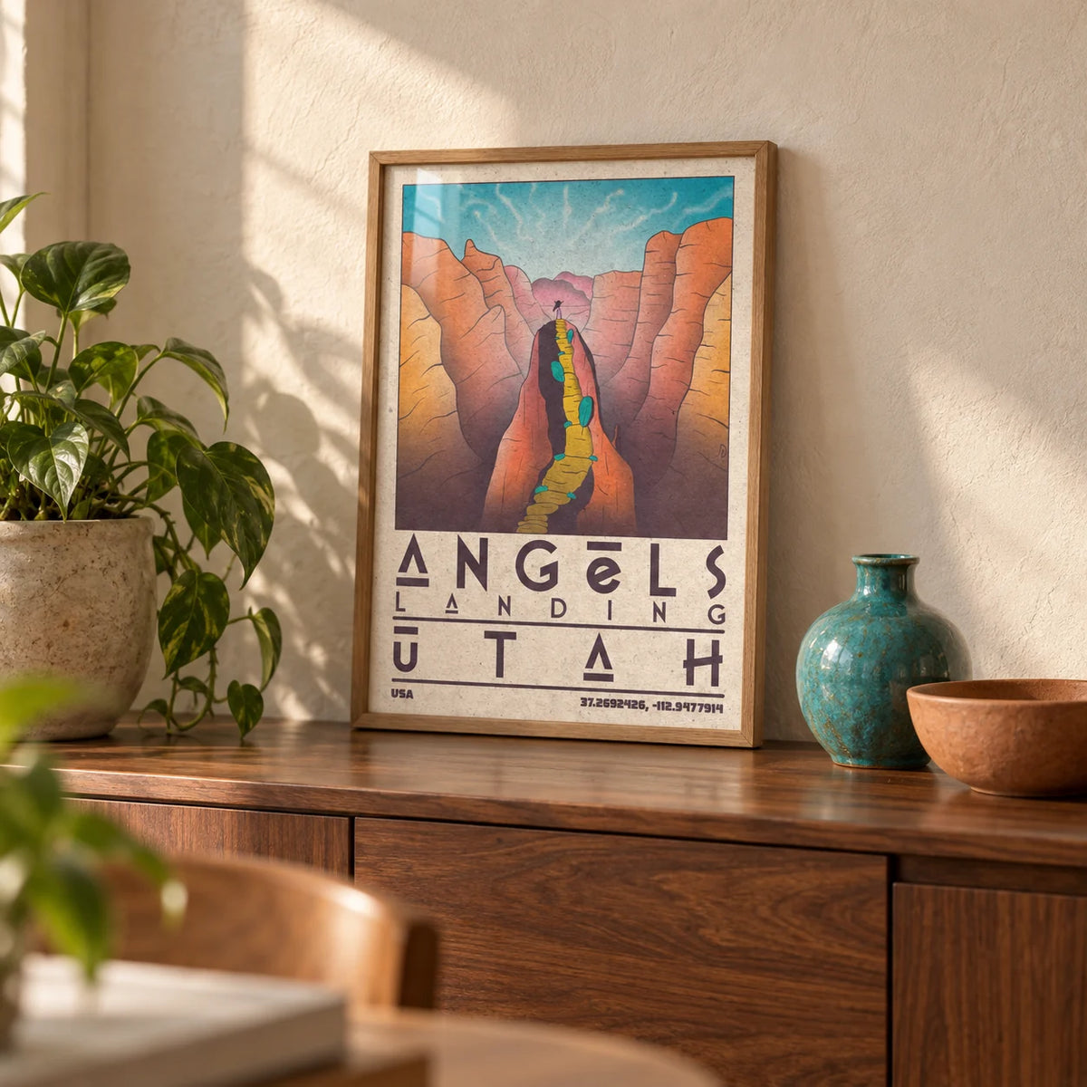 Zion National Park Art, a small A4 framed print leaning on a walnut sideboard in a living room