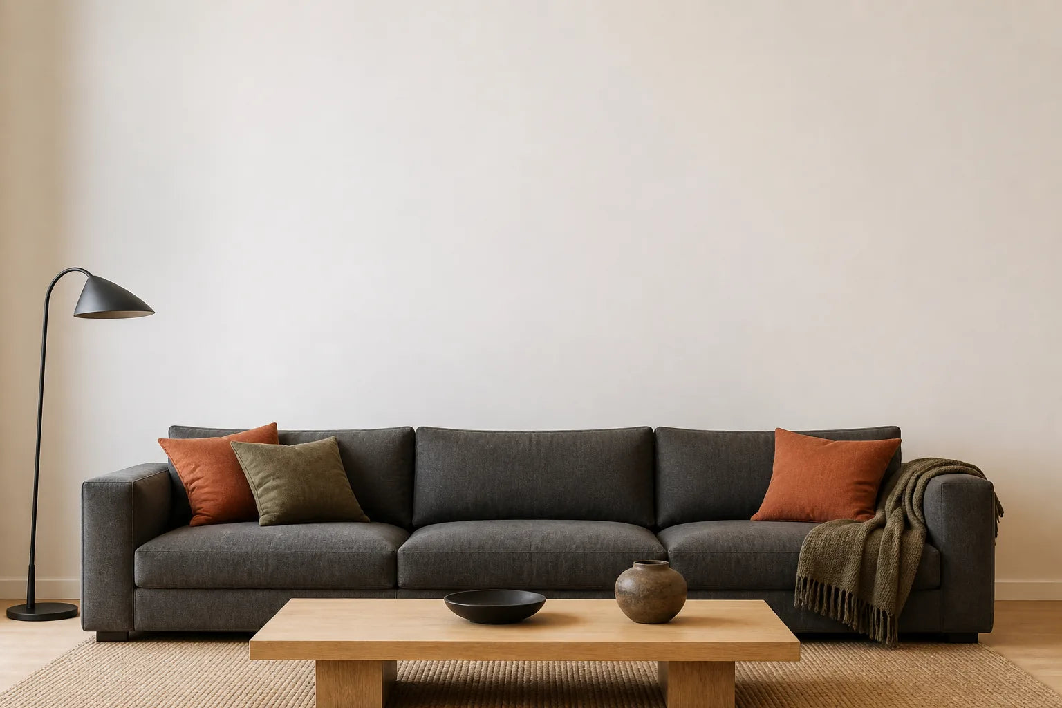 Living room with blank wall above a sofa for wall art sizing