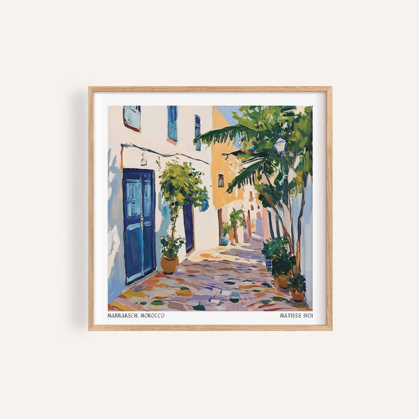 Décoration murale marocaine représentant des portes bleues et des plantes dans une ruelle de Marrakech

