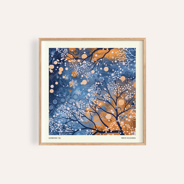 Décoration murale représentant un paysage hivernal avec des branches parsemées de points orange et bleus