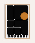 Impressions artistiques pour bureau représentant des formes Bauhaus audacieuses en noir et orange