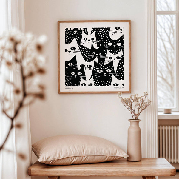 Playful black and white cat wall art with abstract styling