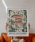 Red and cream Fish Artwork Prints with oversized-eyed fish and leafy shapes.