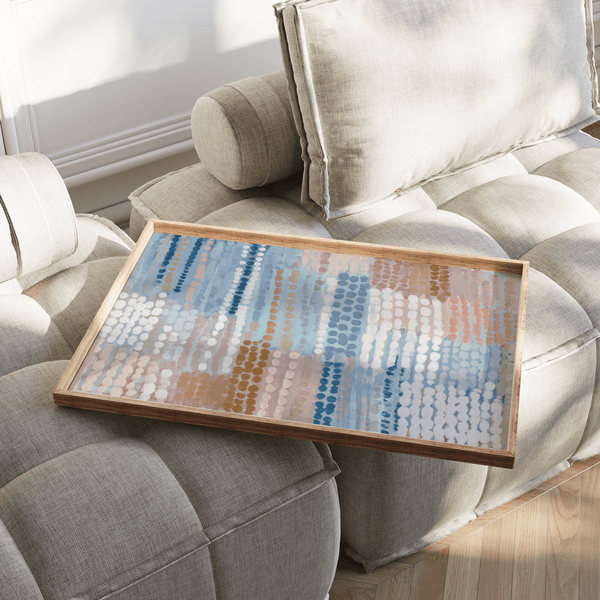 Imprimés abstraits bleu, rose et beige pastel pour décorer les murs d'une chambre d'enfant