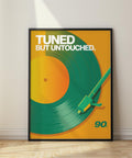 Impression artistique audacieuse sur vinyle avec platine verte sur fond orange.