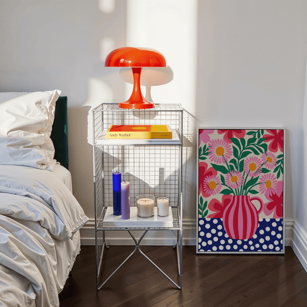 Impression artistique contemporaine représentant des fleurs colorées dans les tons roses et rouges, pour une décoration murale élégante dans votre salle à manger.