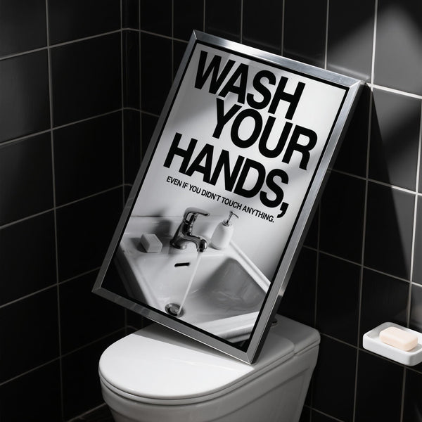 Décoration murale minimaliste pour toilettes avec texte audacieux et scène épurée représentant un lavabo.