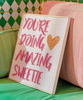 "You’re Doing Amazing Sweetie" quote in bright good motivational posters