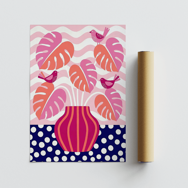 Quadro decorativo con piante tropicali, uccellini rosa e foglie arancioni per uno spazio di lavoro creativo
