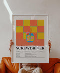 Art prints kitchen style showing a retro Screwdriver cocktail with a pink and orange grid.