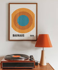 Bauhaus Circle Poster with orange and blue tones.